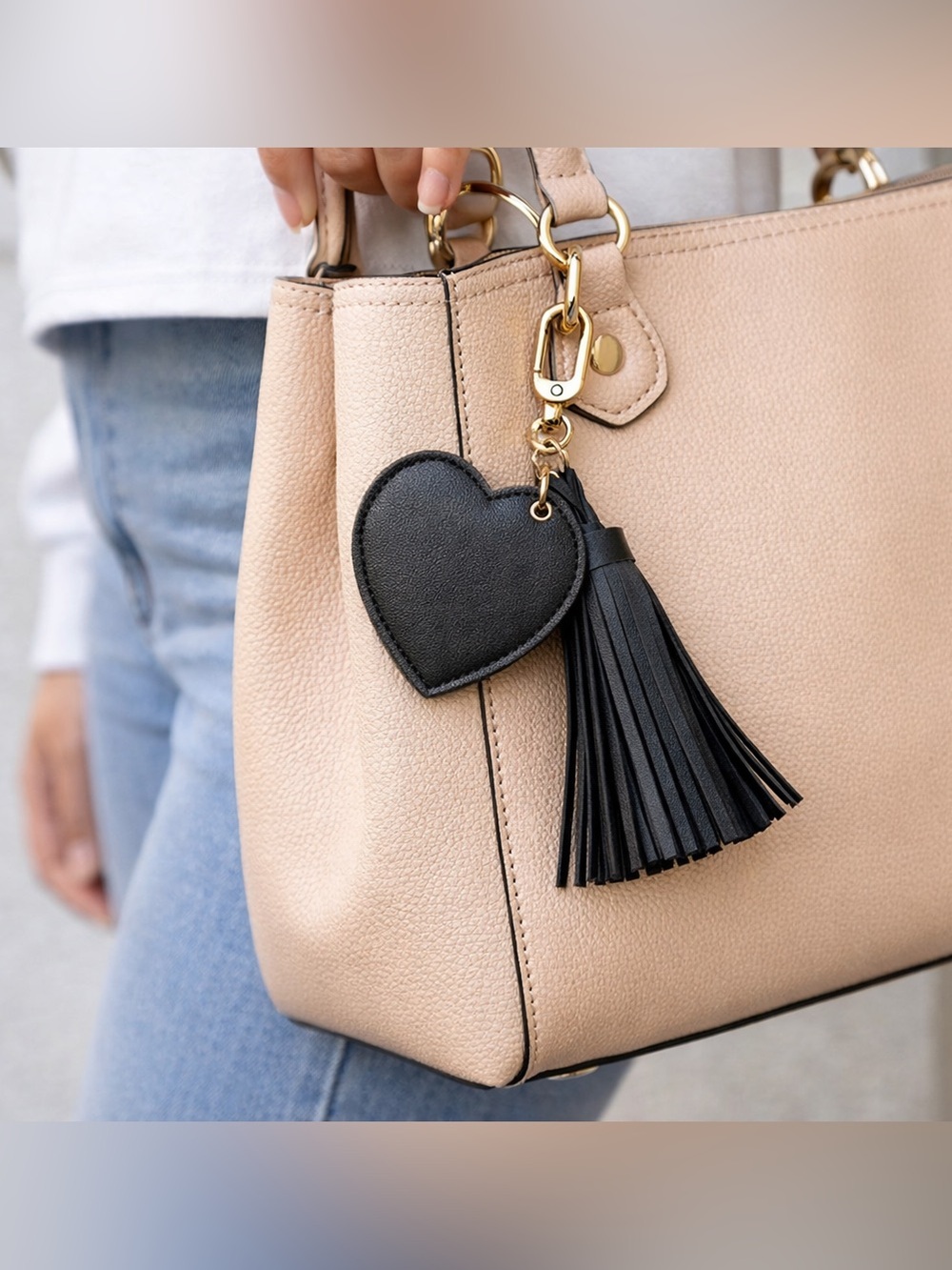 NWT! 🖤 Bag charm or keychain. Faux leather tassel, cute heart shaped mirror